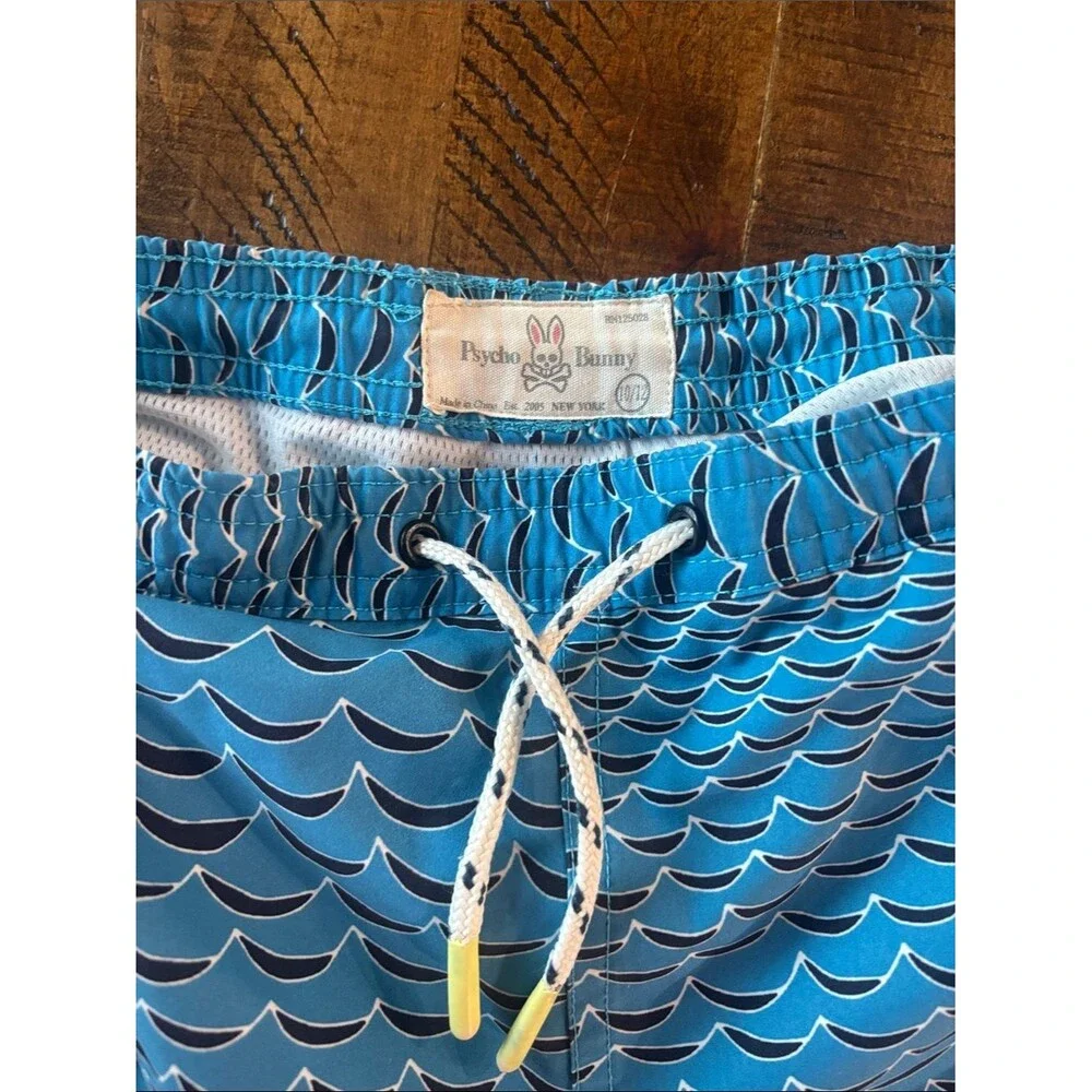 Psycho Bunny Blue Wave Print Boys Lined Swim Trunks in Size 10-12